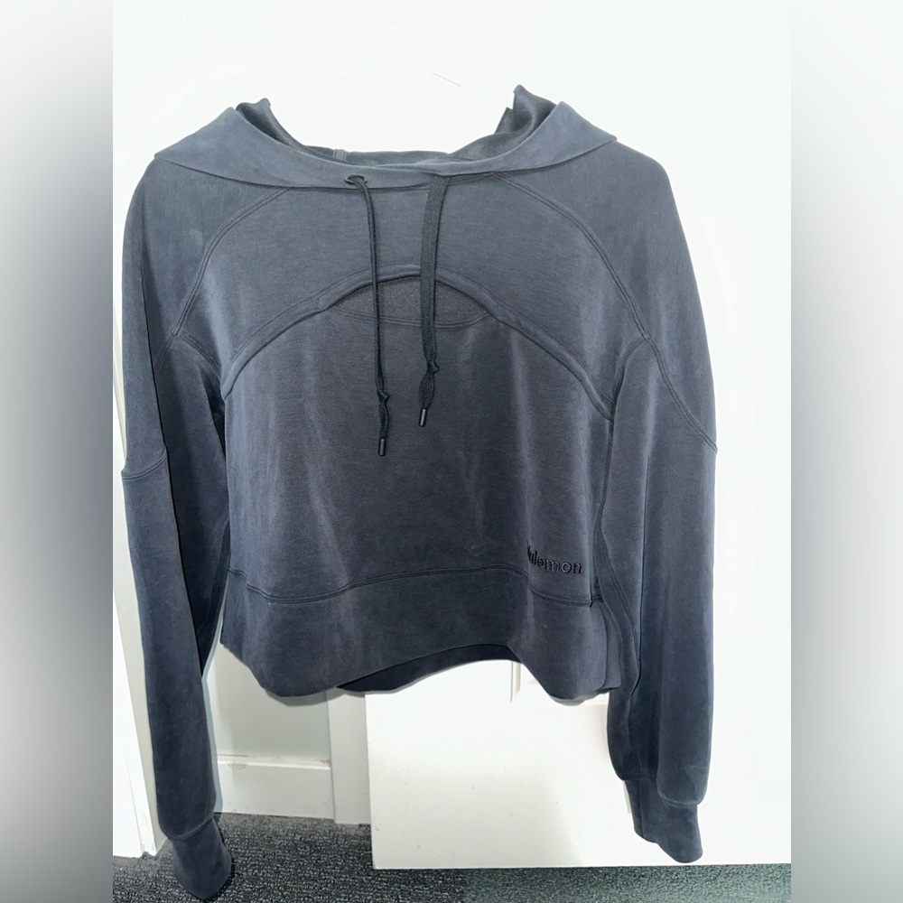 black cropped Lululemon hoodie with cutout